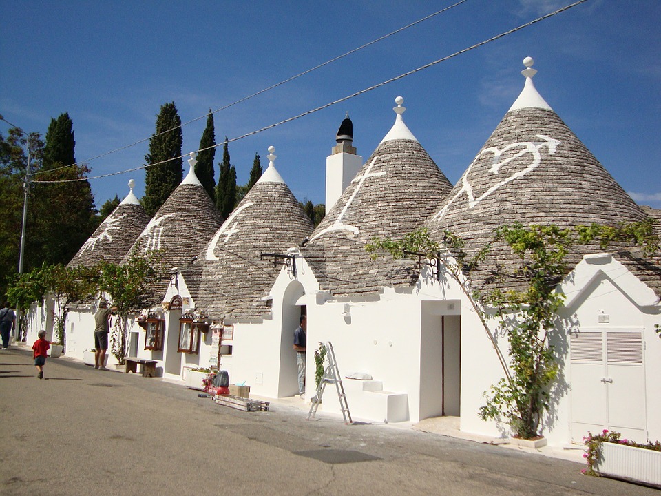 SEARCHING FOR THE LOST MYSTERY OF THE TRULLI, BETWEEN PAGAN AND CHRISTIAN SYMBOLS